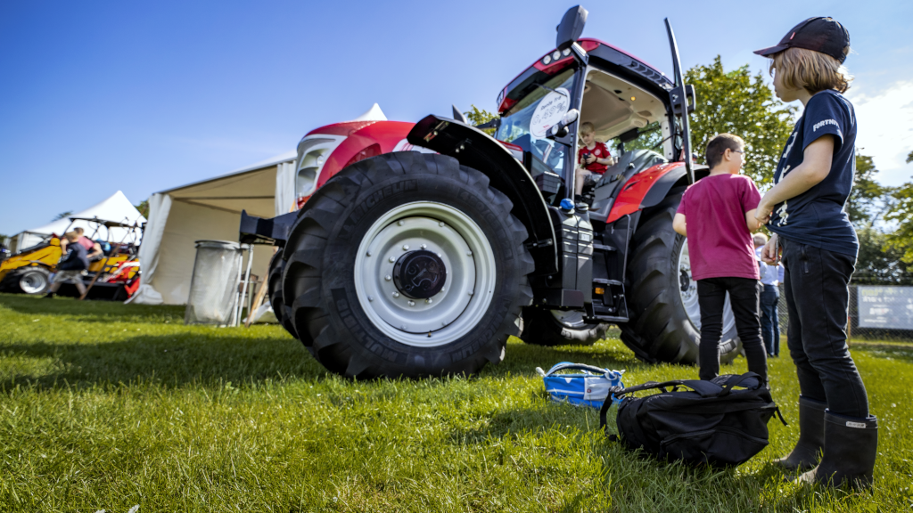 Children looking at a tractor at the agricultural fair in Horsens