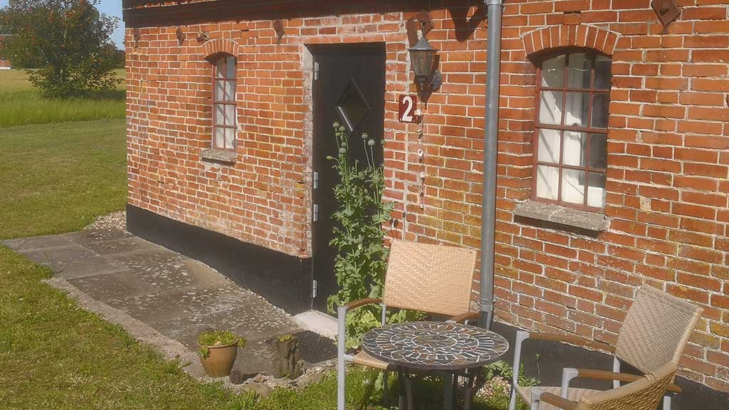 A door leads into a room at Karensdal B&B