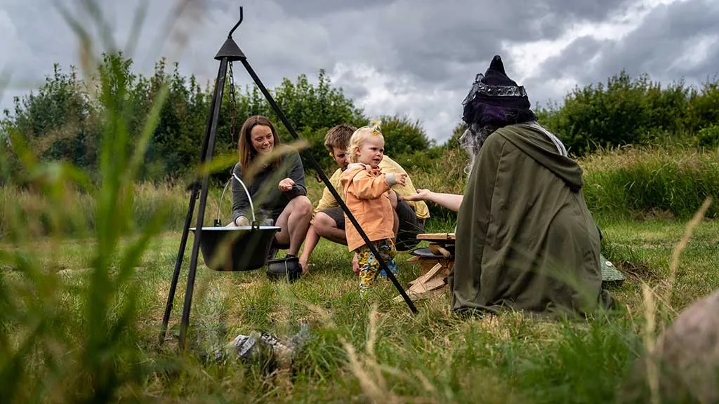 Cooking over the fire in the Fairy Tale Forest with the family