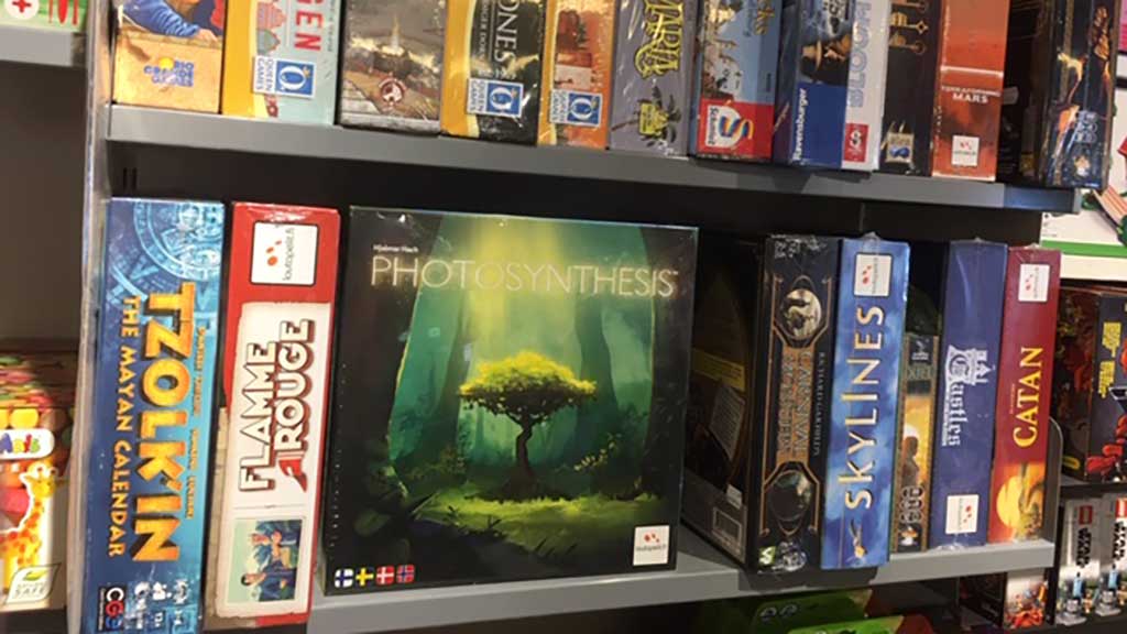 Board games on the shelves at Buchs Boghandel