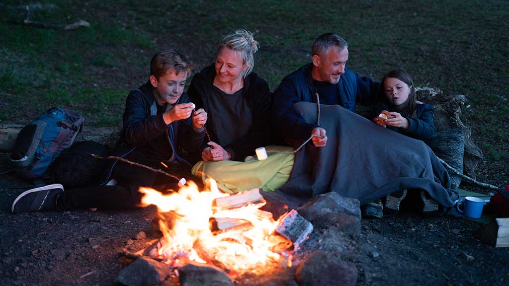 Campfire coziness at the shelter and tent site in Staksrode Forest