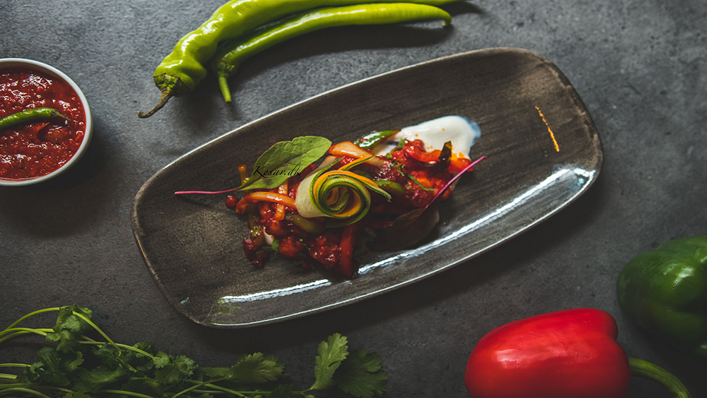 A plate of Indian food at Kesar