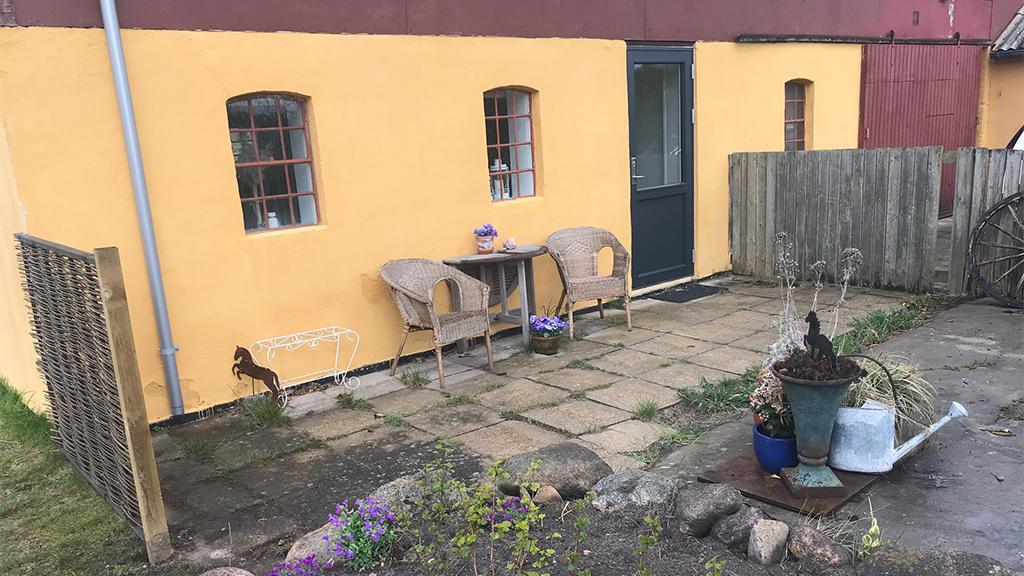 Terrace at a holiday apartment in an old farmhouse on Endelave