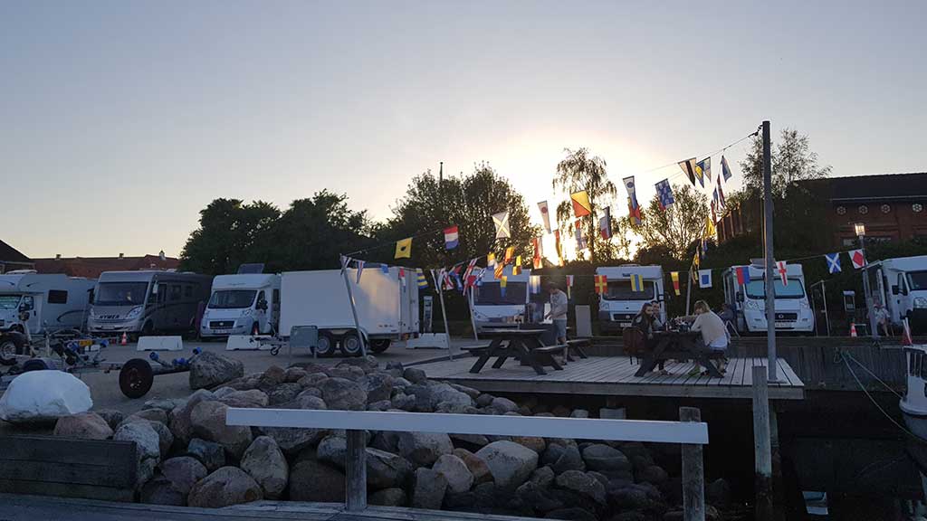 Table and bench set at the camper van site at Juelsminde Harbour