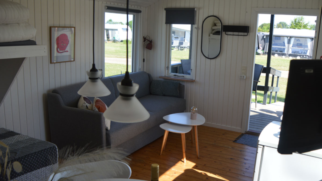 Living room in a cabin at NFJ Naturist - Familiecamping