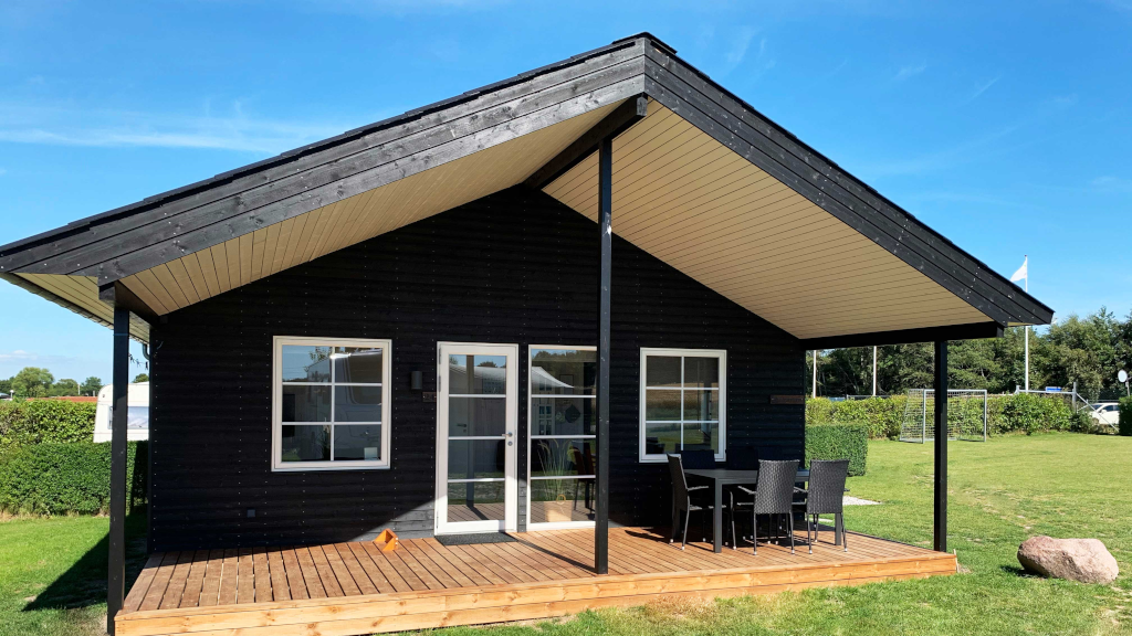 Large cabin with a terrace at Saksild Beach Camping