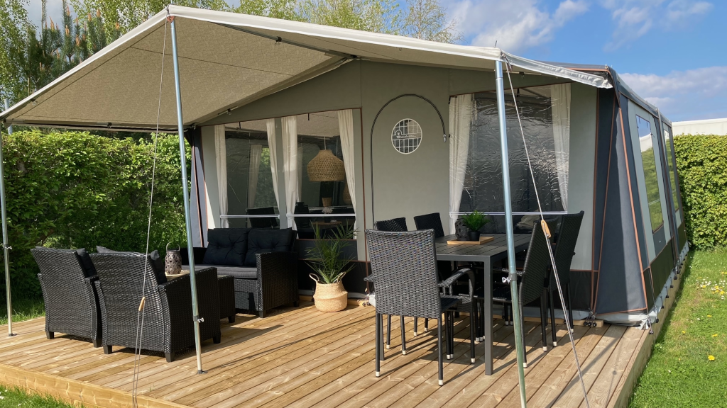 Glamping tent with a large terrace at Saksild Beach Camping