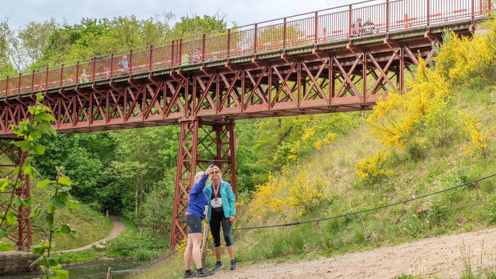 Female runners at the Uncovered Bridge