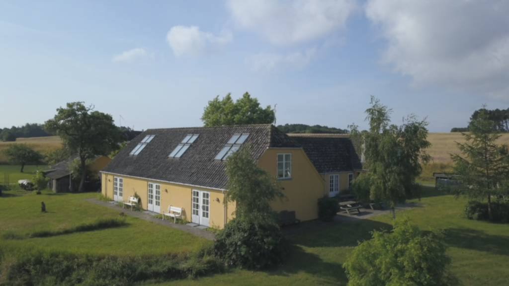 Drone photo of the garden and the house Blåkærgård on Tunø