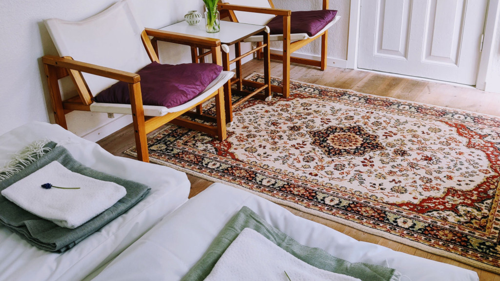 Made beds in a room at Blåkærgård on Tunø
