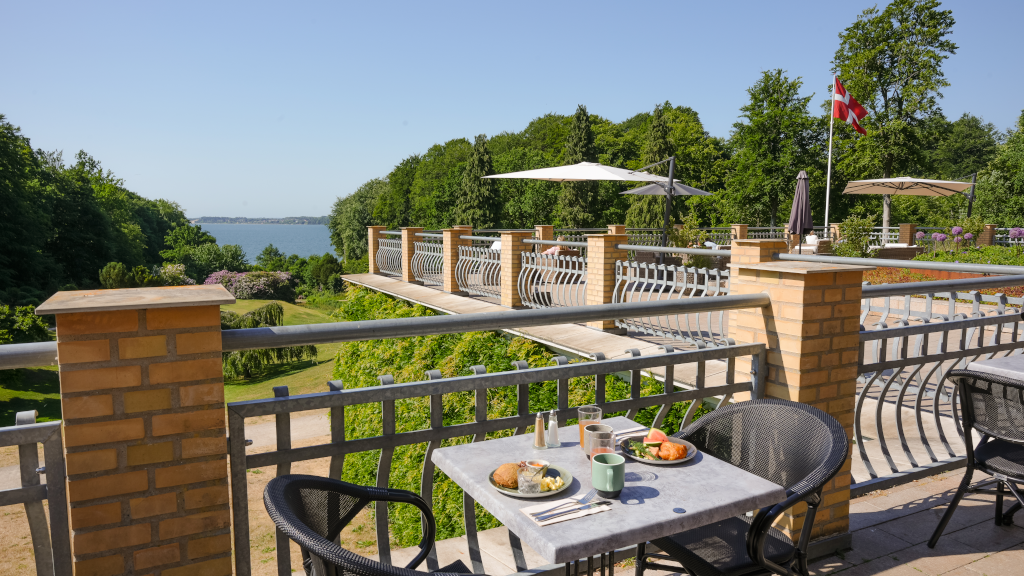 Breakfast on the terrace at Hotel Vejlefjord