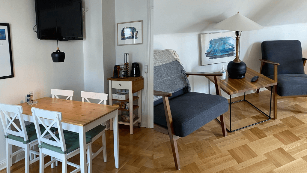 Lounge area with tables and chairs in the living room at Holsteinshus B&B in Odder