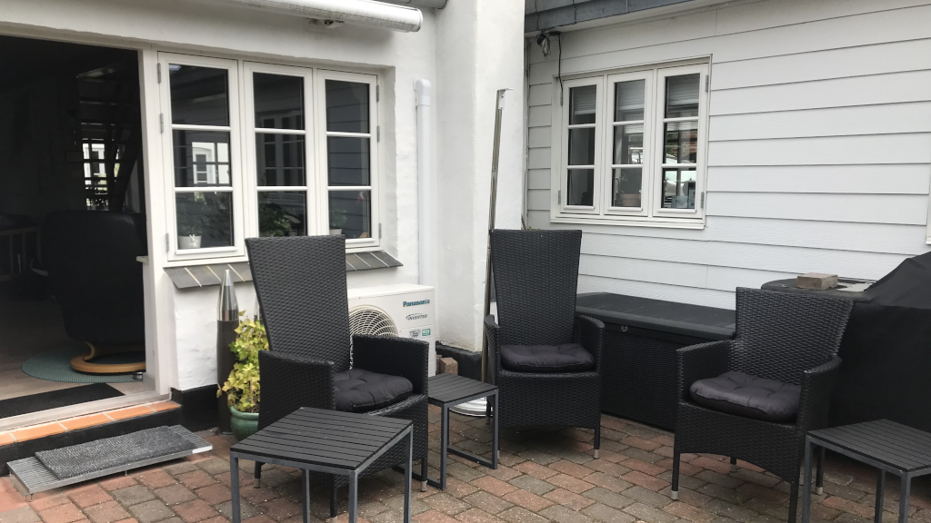 Terrace with garden furniture at Bed & Breakfast K22 in Endelave