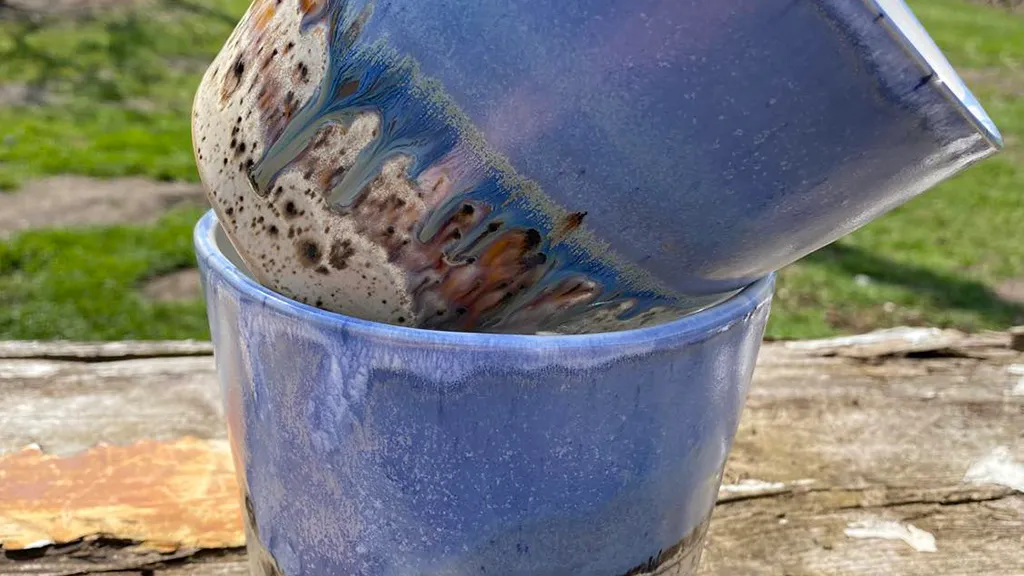 Lavender-colored glazed coffee cups made by Laila Madsen from LM Unika