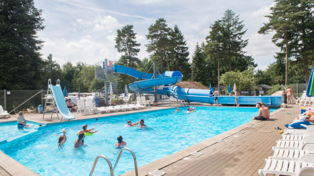 Swimming pool and water slide at Vestbirk Camping.