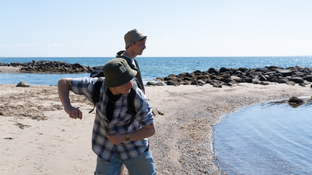 Two men doing a skip on Snaptun South Beach