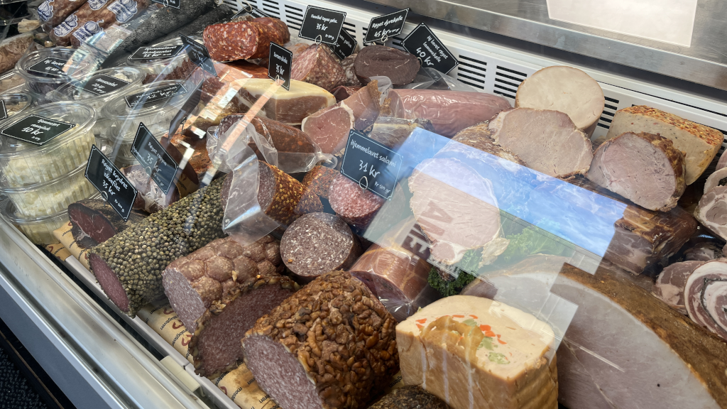 Salamis and other cold cuts in the display case at Slagter Laursen in Brædstrup