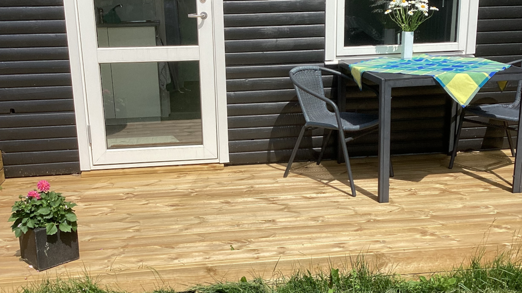 Sunny patio at the summer house at Anneks127