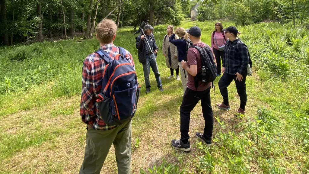 A group is on a guided tour of Vorsø with a nature guide