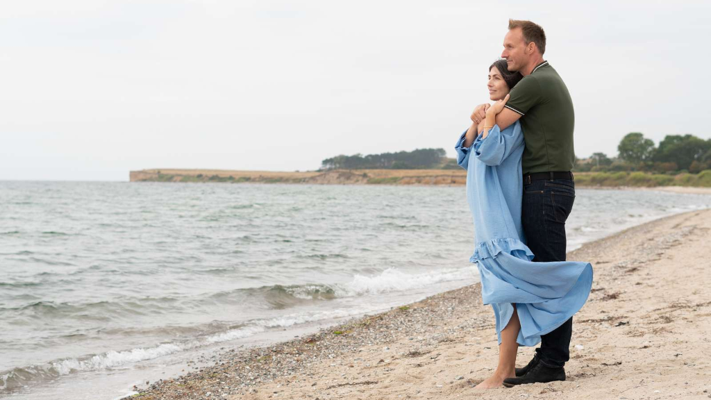 A couple holding each other on a beach on Tunø