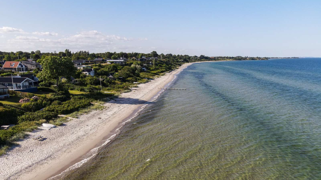 A drone photo of Rude Strand on a sunny day