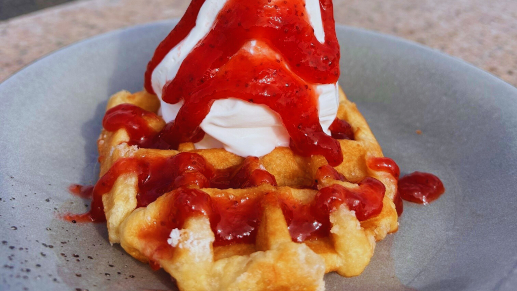 Belgian waffle with ice cream and strawberry jam at Havnens Café & Isbar in Juelsminde