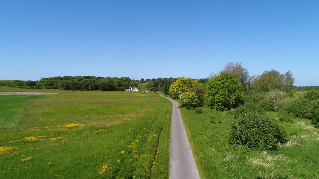 Aerial photo of a road through fields on Tunø