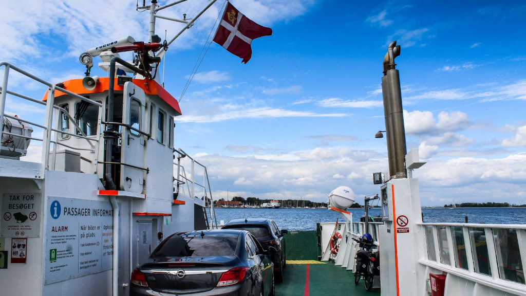 The wheelhouse and cars on the deck of the Hjarnø Ferry