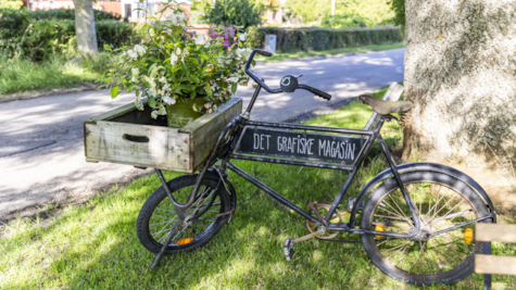 Ladcykel med teksten "Det Grafiske Magasin"