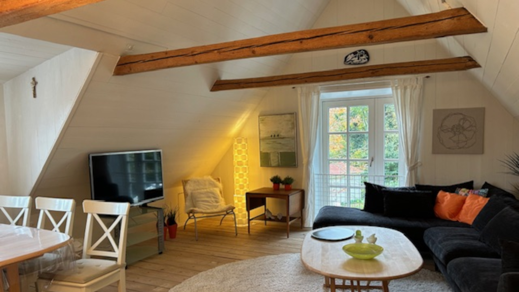 The living room in the holiday apartment at Dyrekærhuset