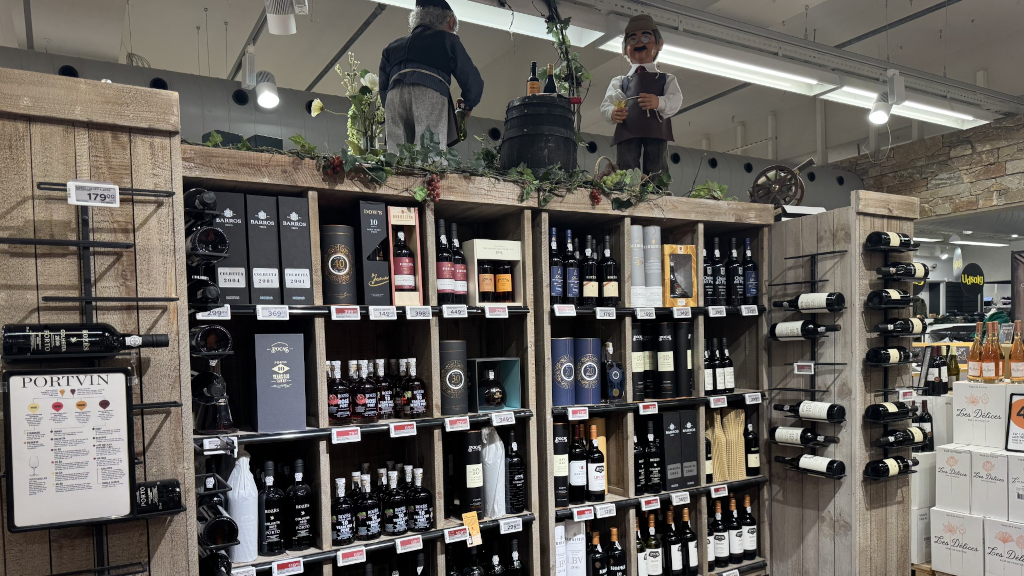 A large selection of port wine on the shelves at Kvickly Odder