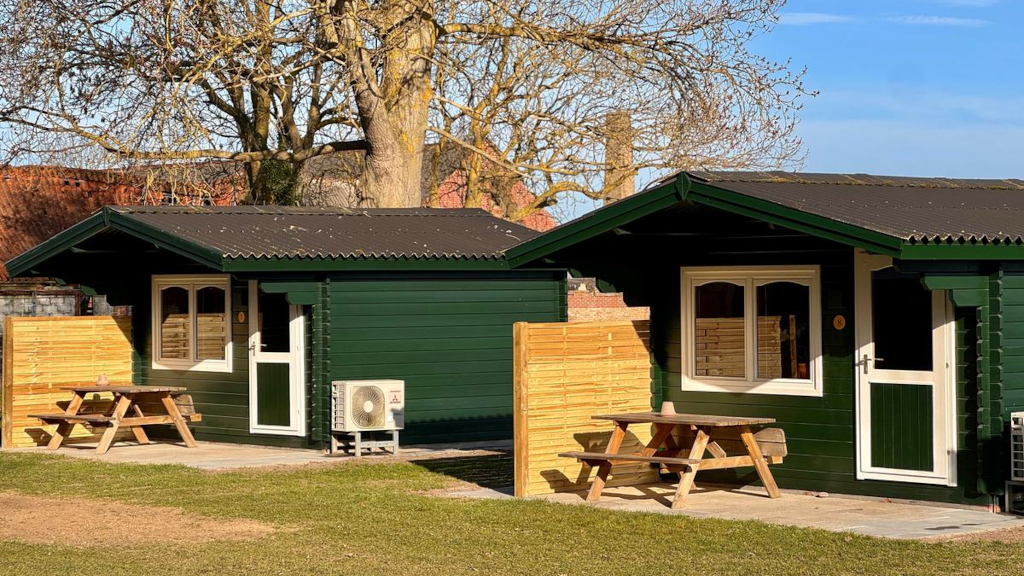 Two cabins with terraces at Campingpladsen Endelave seen from the outside