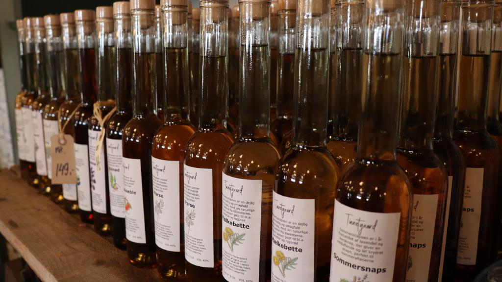 Bottles with different flavoured varieties of schnapps from Tinnetgaard