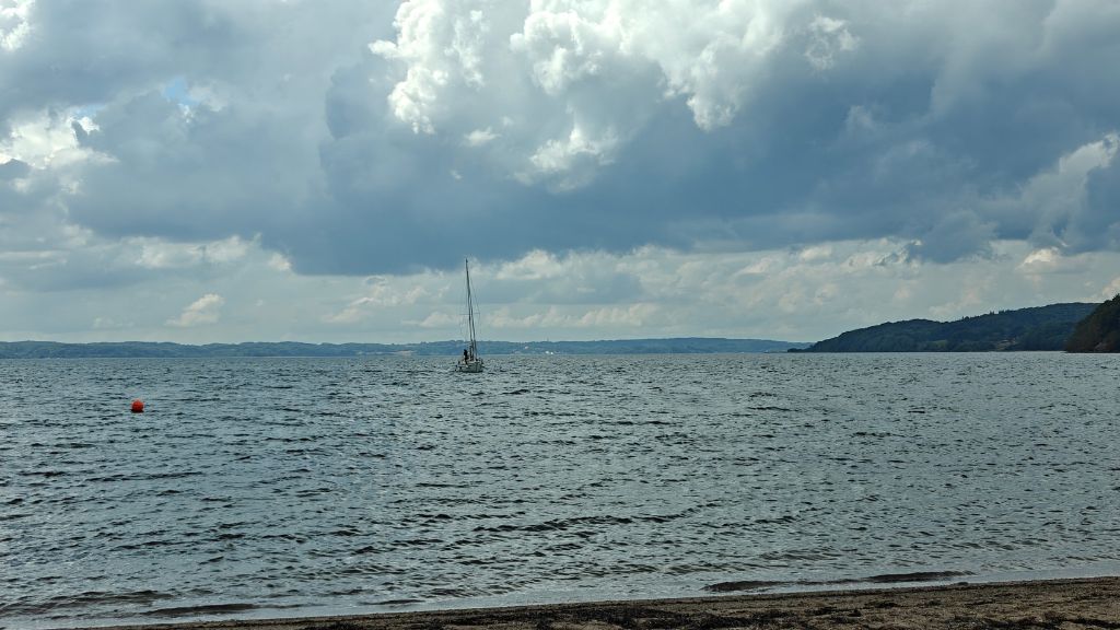 Boat on the water near Rosenvold Harbour and Beach.