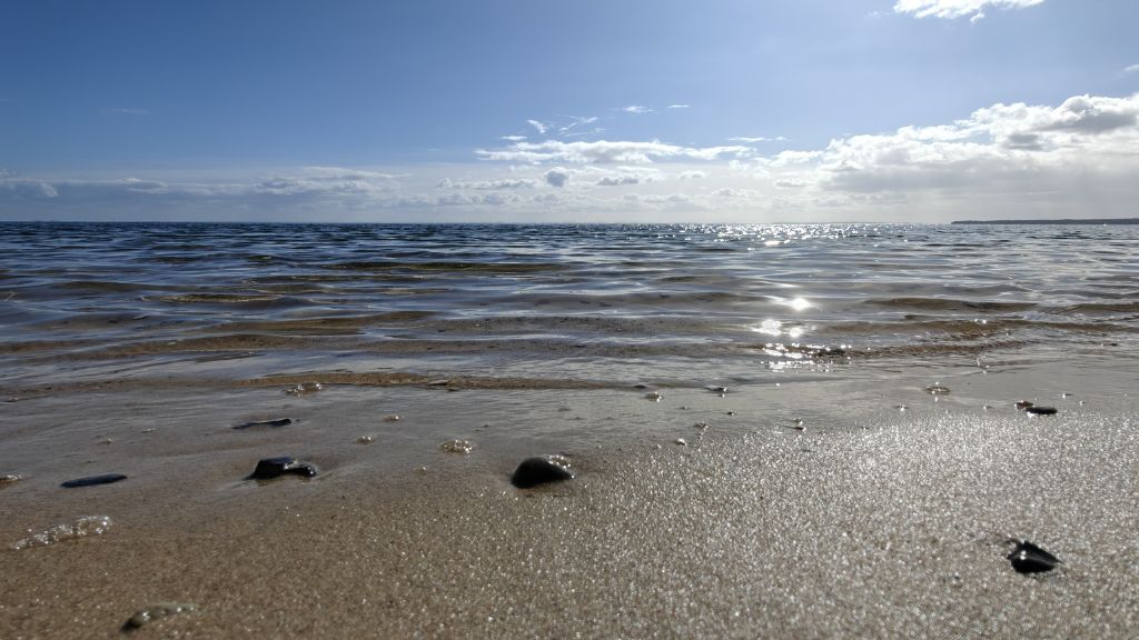 The beach at Stenhøj Beach. Blue skies and sunshine.