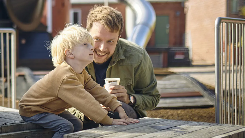 Boy and dad at the playground