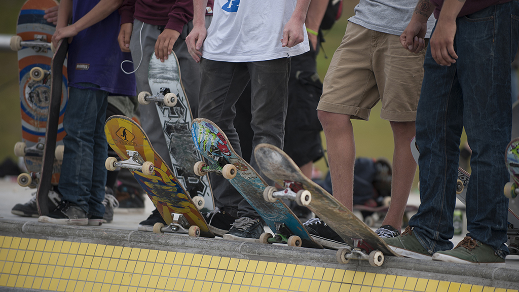 Skater riding down a concrete slope at Rabalder Parken