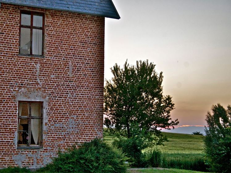 Brick facade and trees at Trudsholm Estate