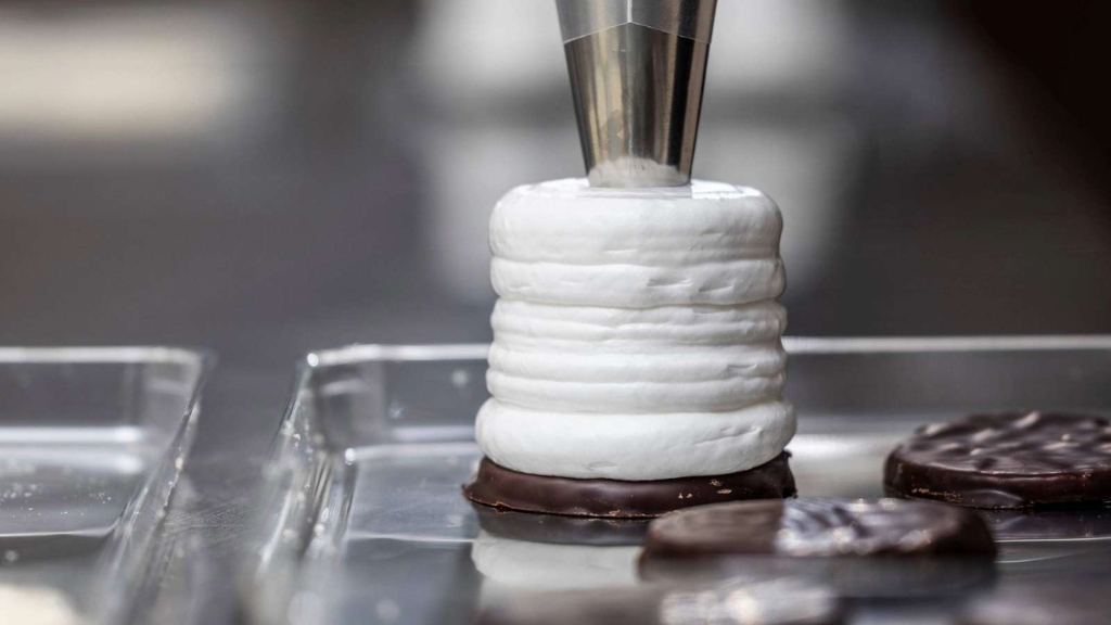 Making chocolate-coated foam treats at Frellsen