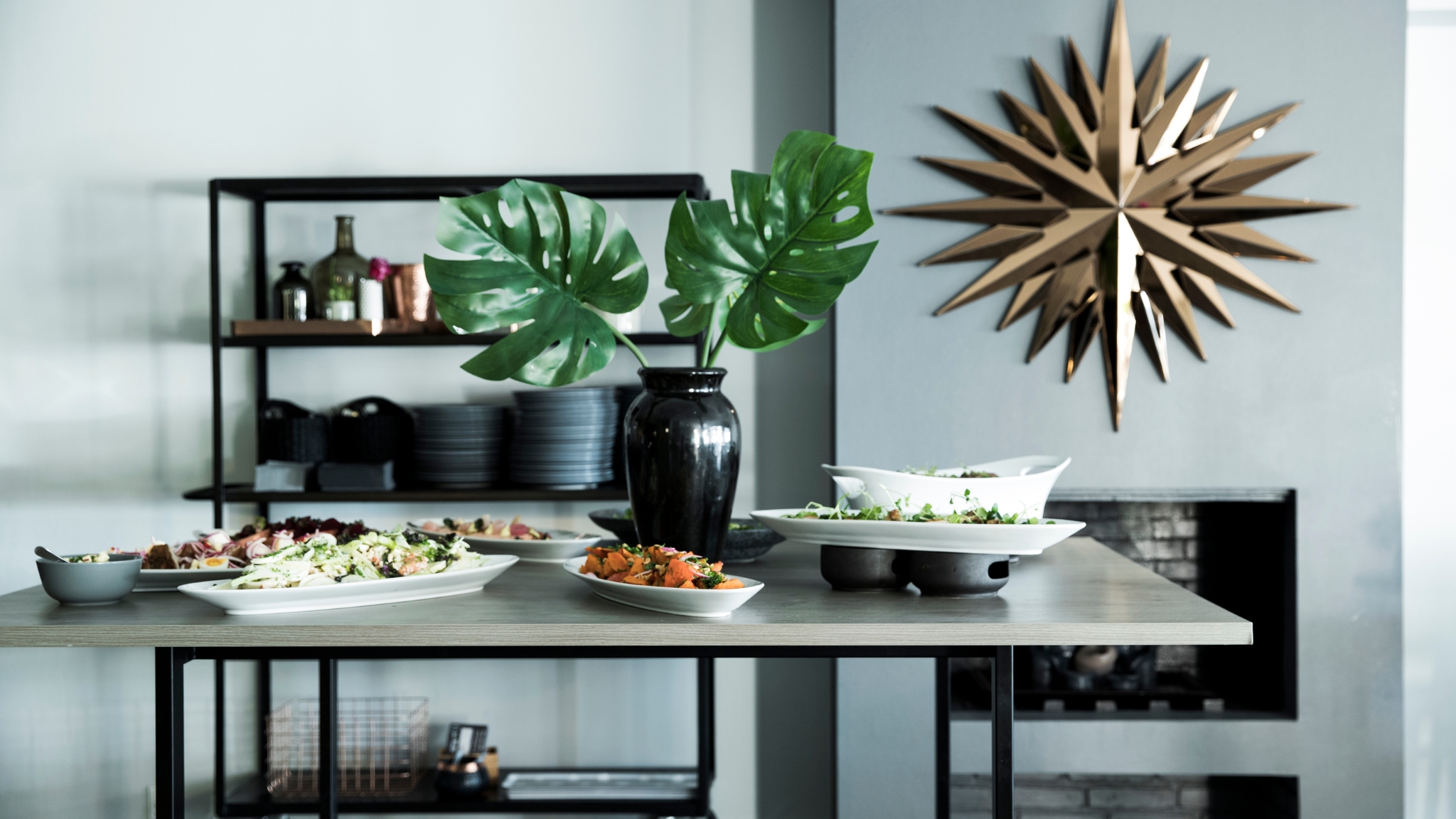 Buffet table with salads and serving dishes at Skjalm Hvide Hotel.
