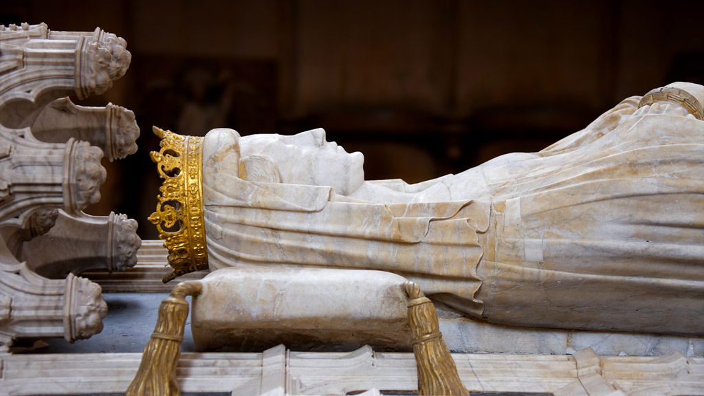 Marble sarcophagus with golden crown sculpture of Queen Margrete I at Roskilde Cathedral.