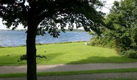 Lawn and views of Roskilde Fjord at Kalvø