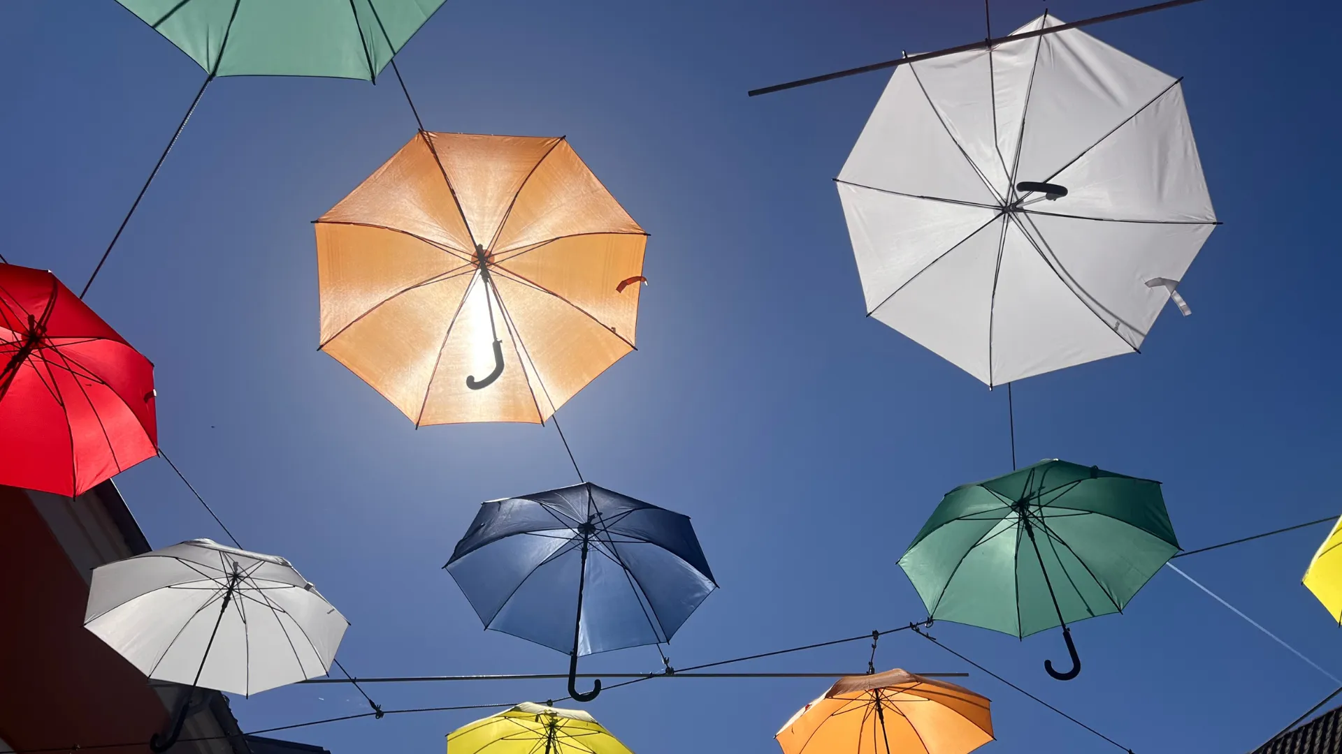 The umbrellas in Vejle Midtpunkt seen from below looking up