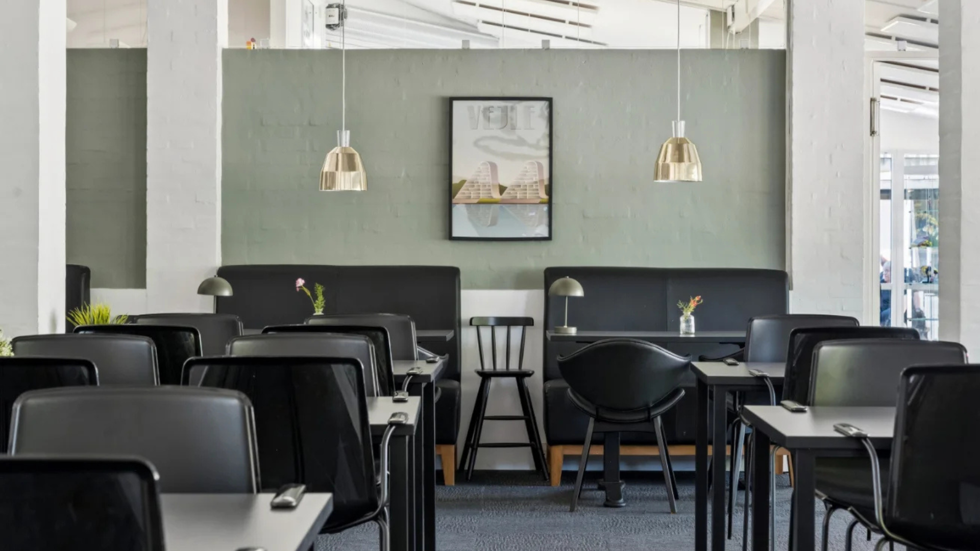 Dining area with a high chair at Danhostel Vejle