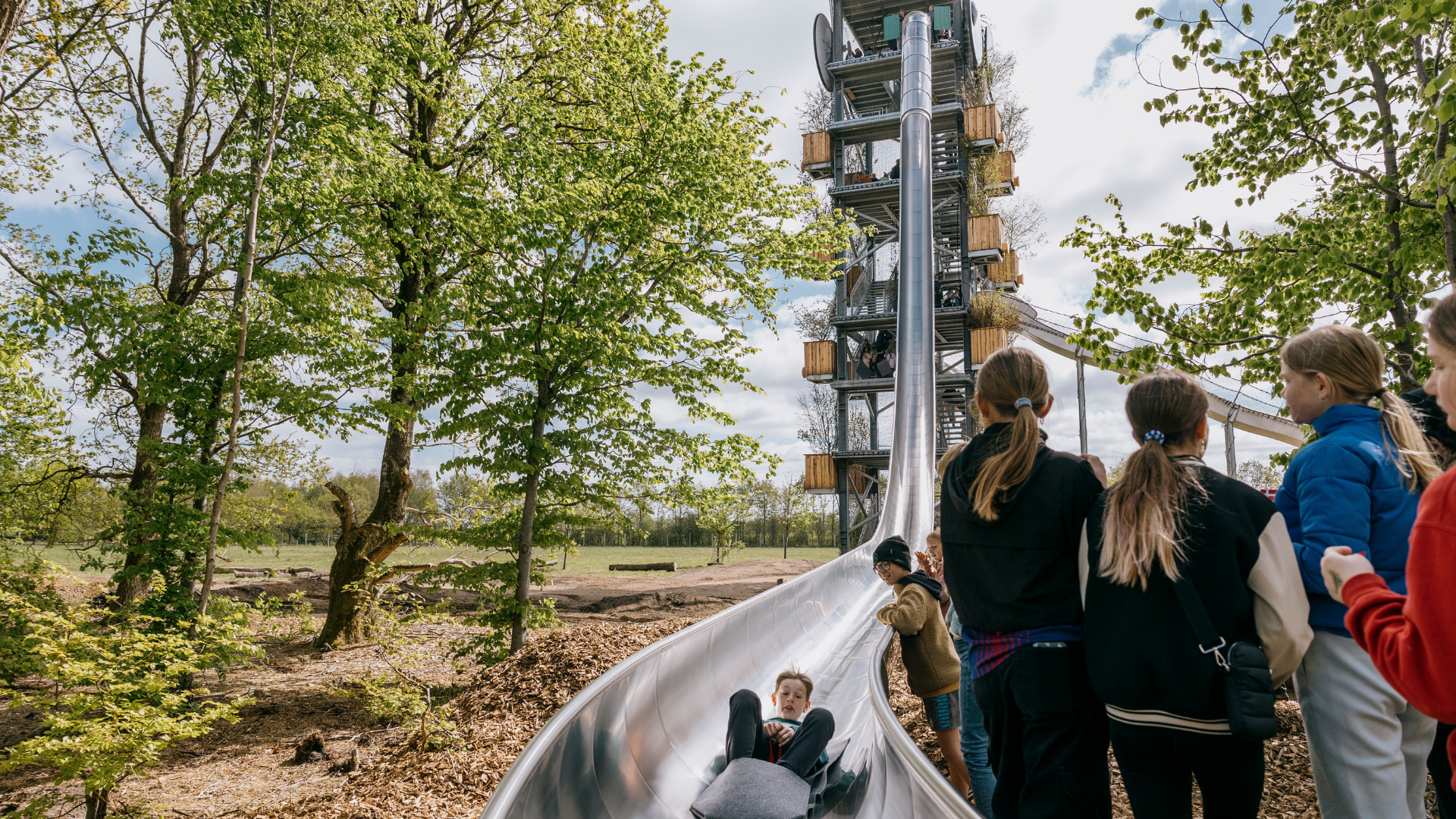 Roller coaster in WOW PARK with children in line