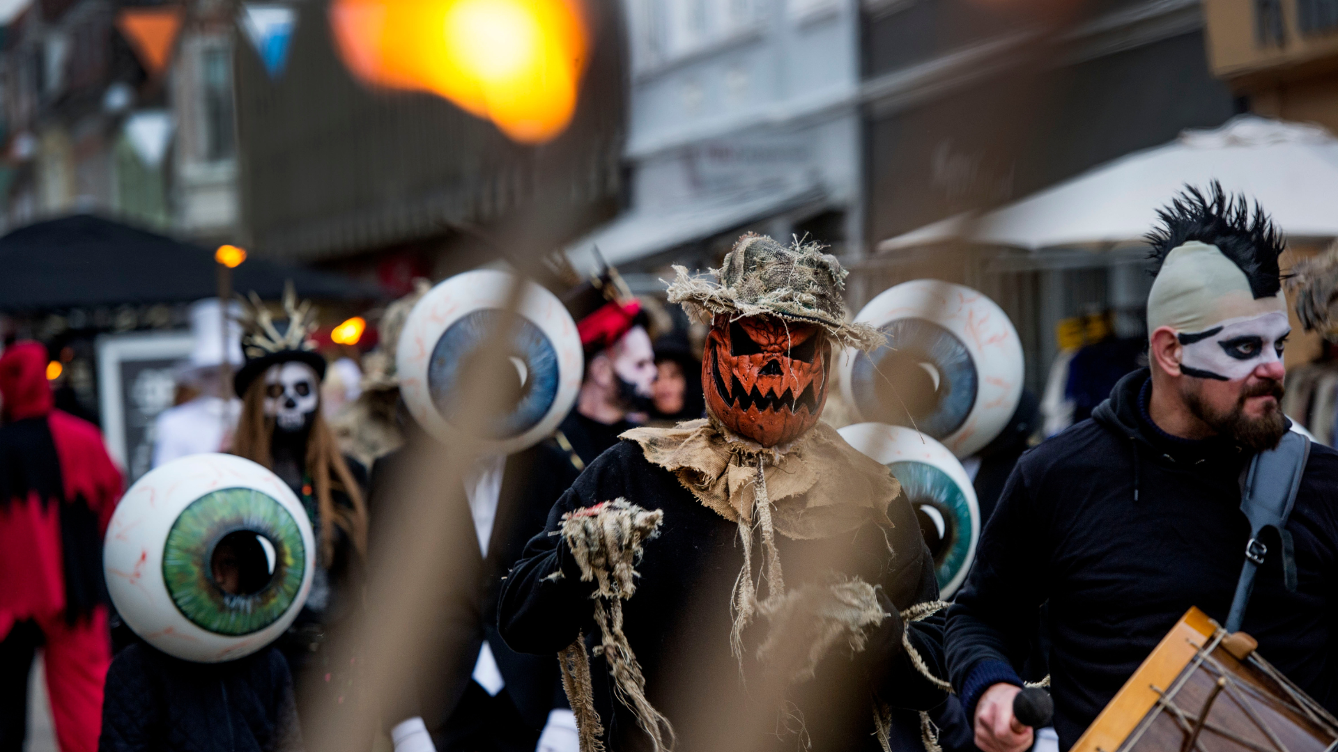 Halloween parade in Vejle with participants dressed as eyes and pumpkins
