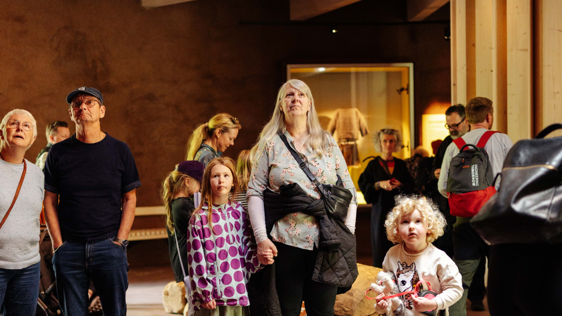 Guests listening in the exhibition at Egtvedpigens Verden