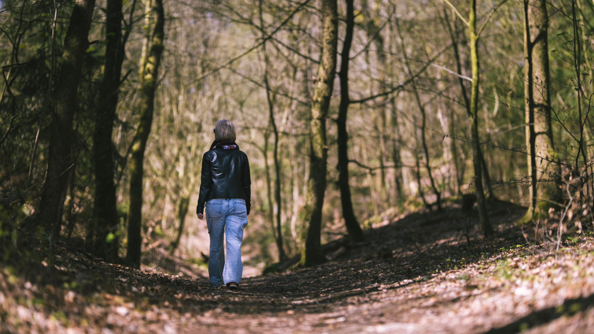 Woman walking on the trail in Egtved on a spring day in nature