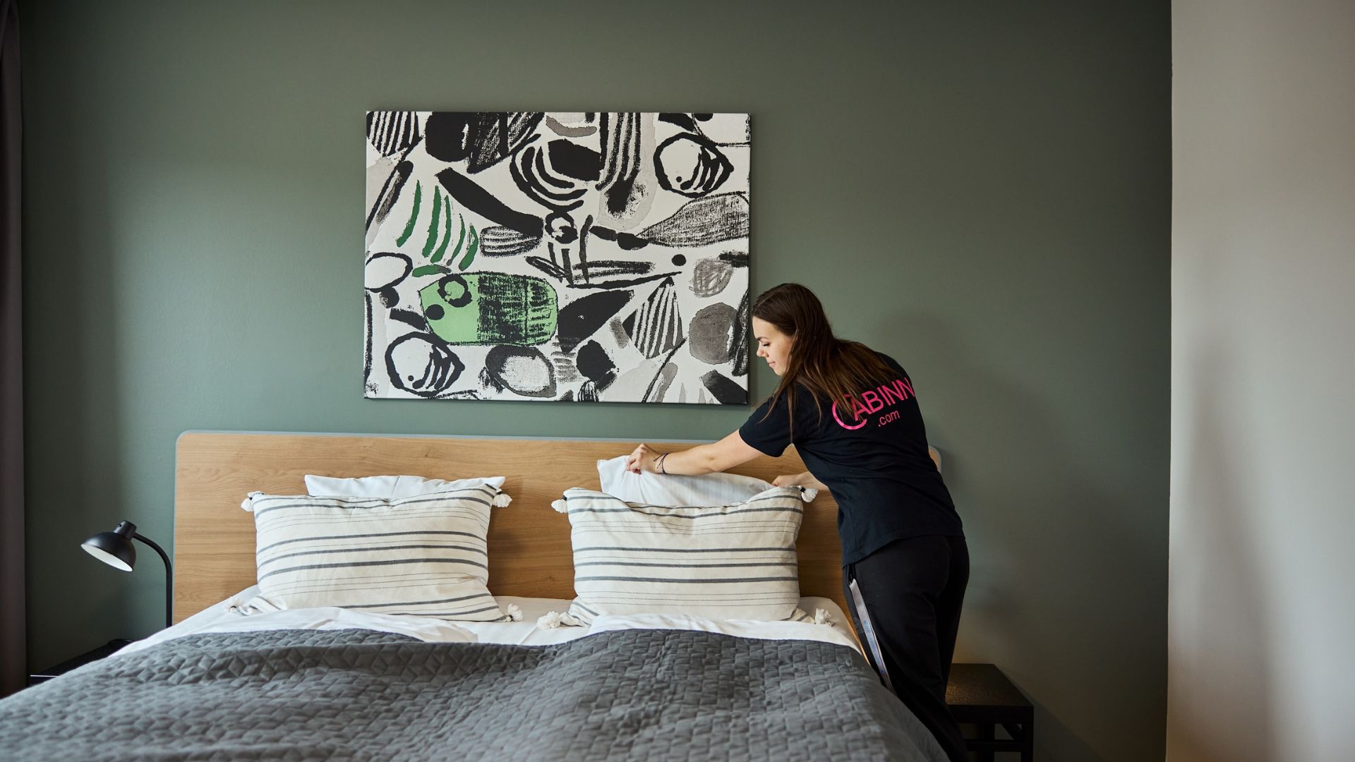 A double room being prepared at CABINN Vejle