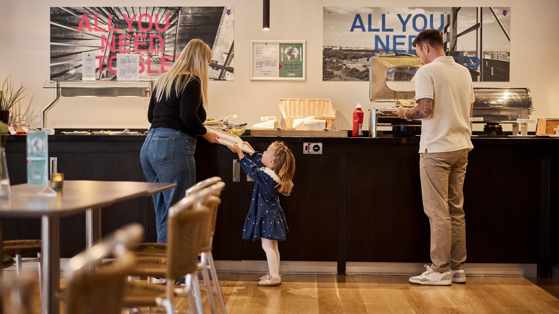 A family at the breakfast buffet at CABINN Vejle